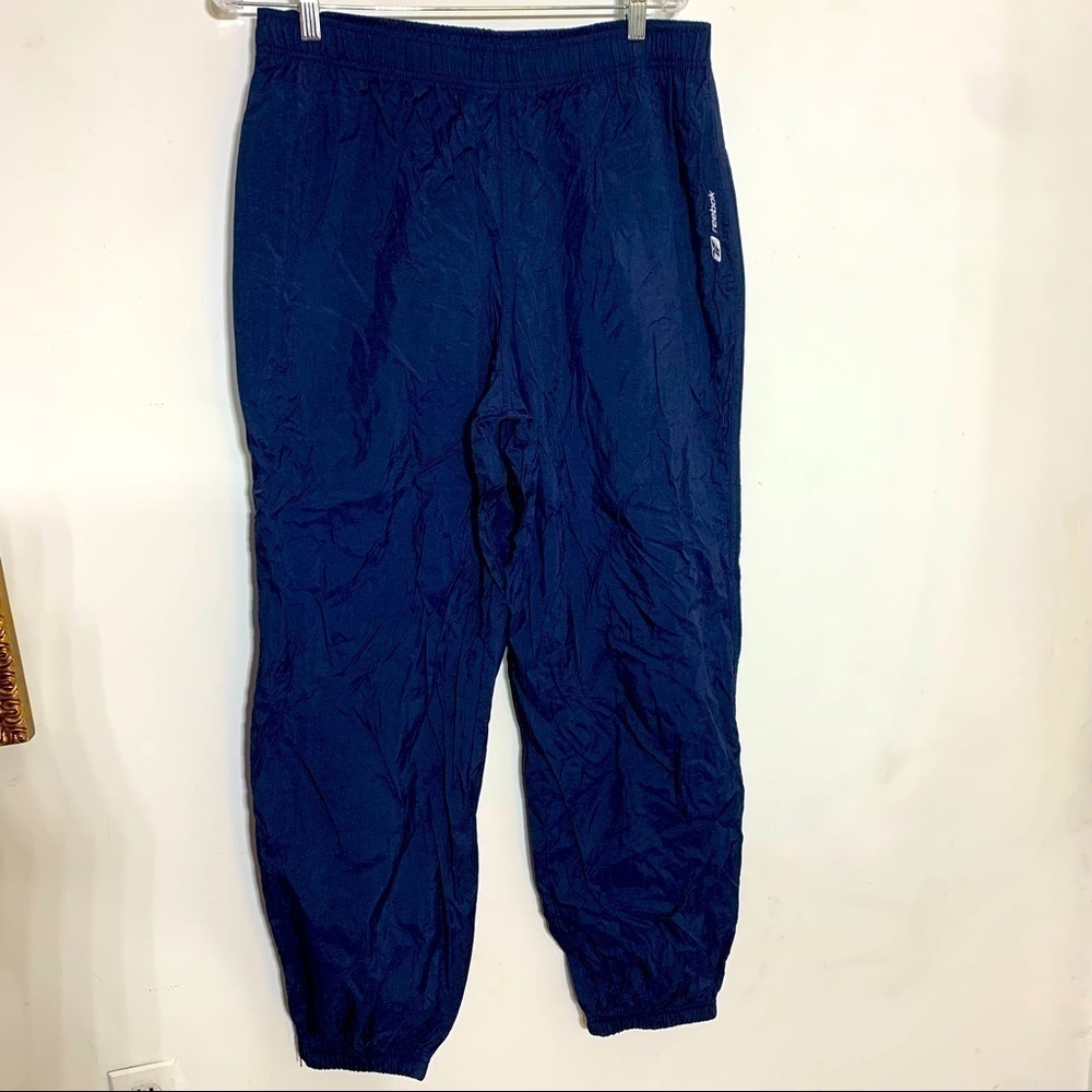 Vintage Reebok 90s solid navy blue windbreaker Performance Pants menβs large